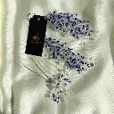Tocado de plata y azul novia Icónica mujer.webp